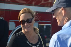 A grateful Flagler Beach Mayor Linda Provencher with Scott, who later hugged her. Click on the image for larger view. (© FlaglerLive)