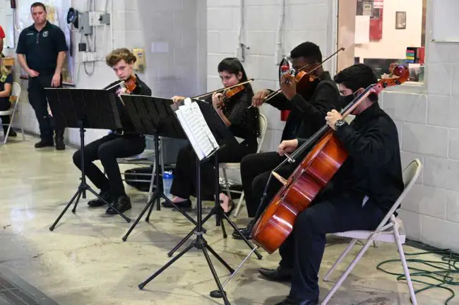 The Flagler Youth Orchestra Quartet performing "Let There Be Peace on Earth." (© FlaglerLive)