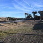 Where Ragga Surf Cafe used to be: the south end of the River to Sea Preserve's parking lot in Marineland has returned to its former look, with Ragga Surf Cafe's food truck and two campers gone, along with nearly two dozen picnic tables that had spread on the grounds and along the boardwalk. The county has covered the formerly occupied space with straw, sopping up whatever fluids may have leaked from the vehicles' four-month presence there. Marineland and Flagler County government are striving to return to compliance with state rules controlling the preserve. (© FlaglerLive)