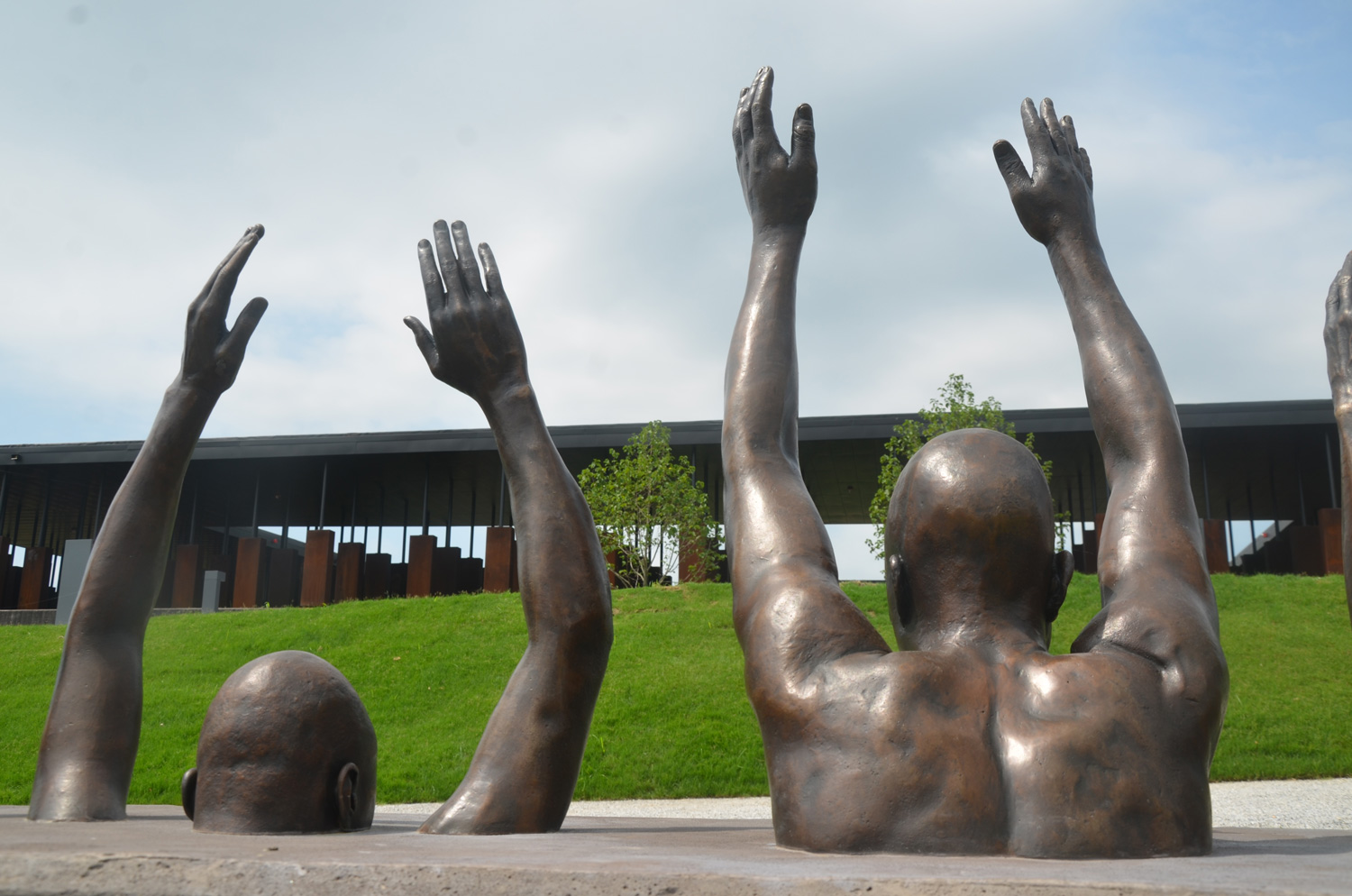 Detail from Hank Willis Thomas's 'Raise Up,' a sculpture reflecting the bias of the criminal justice system against blacks, at the newly opened National Memorial for Peace and Justice in Montgomery, Ala. Click on the image for larger view. (c Pierre Tristam / FlaglerLive)