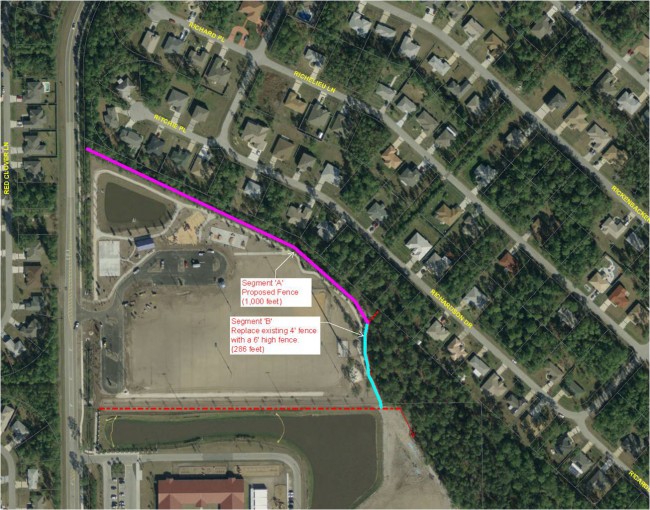 Trench warfare: Ralph Carter Park on one side, Richardson Drive on the other, with the proposed 1,000-foot fence in hot pink. Click on the image for larger view.  (© FlaglerLive)