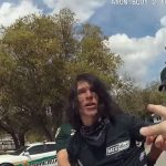 Raymond Glass spent the better part of 20 minute syelling insults and claims of police brutality at Flagler County Sheriff's deputies and Bunnell police officers on Monday as he was arrested. (© FlaglerLive via FCSO bodycam footage)