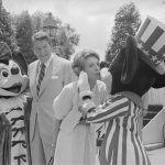 First lady Nancy Reagan kisses Mickey Mouse as President Ronald Reagan and Minnie Mouse watch 20 bands marching in the unofficial inaugural parade at Disney’s Epcot Center on Memorial Day, May 27, 1985.