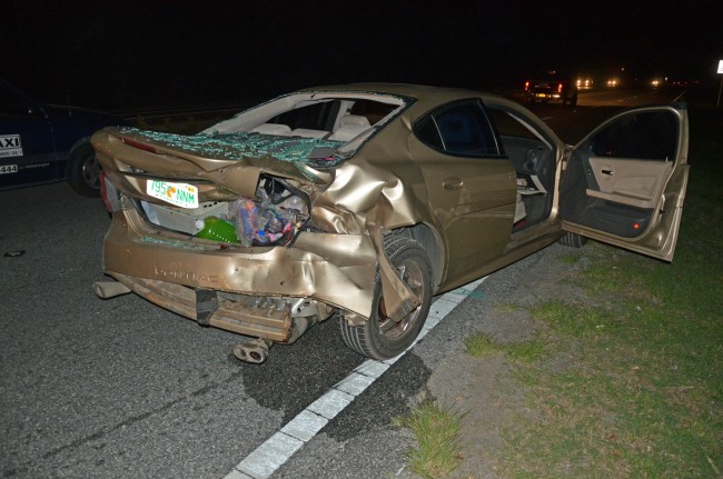 The Pontiac's driver and a child passenger were taken to Florida Hospital Flagler, as was the driver of the Ford that struck the Pontiac. Click on the image for larger view. (© FlaglerLive)