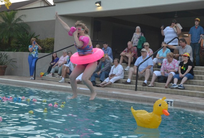 Rebecca DeLorenzo dives in. Click on the image for larger view. (© FlaglerLive)