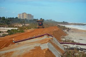 The makeshift wall of sand in place of the old dunes at Washington Oaks Gardens State Park. Click on the image for larger view. (© FlaglerLive)