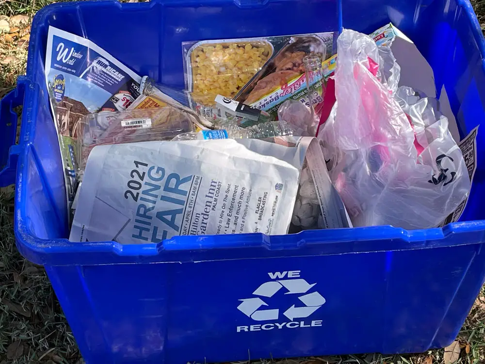 The look of recycling changed today in Flagler Beach. (© FlaglerLive)
