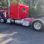 The truck that had been reported stolen was in a corner of the parking lot at Palm Coast's Days Inn, where two suspects were spray-painting it scarlet red, making it, ironically, that much more conspicuous. A witness saw the spray-painting and called in to the Sheriff's Office. (FCSO)