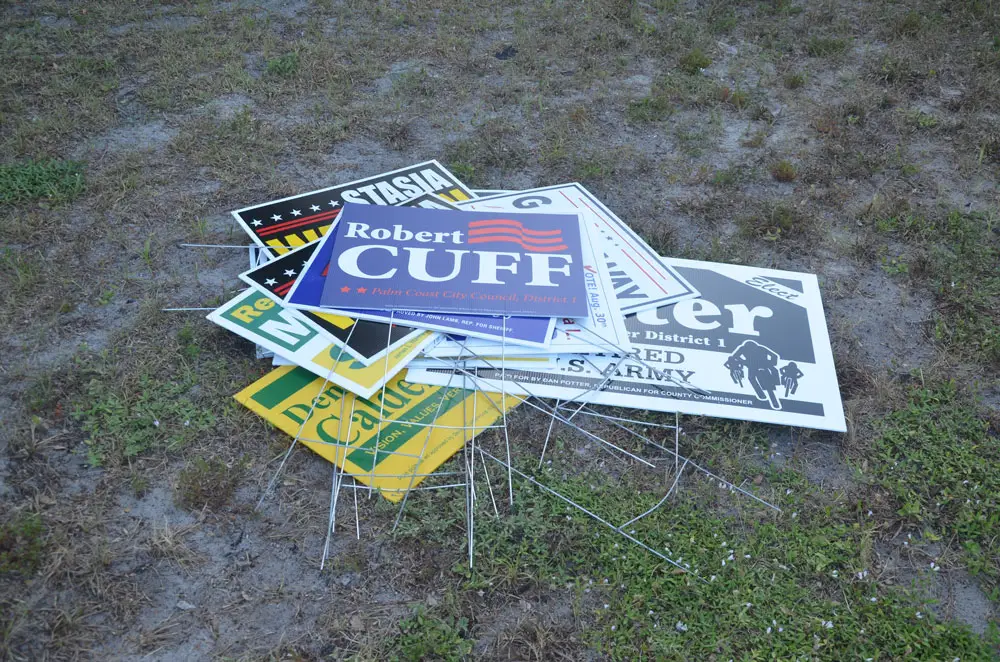 Like old signs from previous elections, in-person election forums are largely relics of former times. Flagler Tiger Bay Club is striving to offer a live forum featuring the candidates in person, for an audience at home, through live radio and video streaming, next week. (© FlaglerLive)