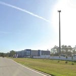 An image of the proposed cell tower location in Hunters Ridge, with a cell tower photoshopped into the picture. (Flagler County)