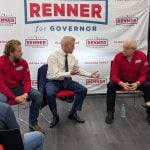 Paul Renner speaking with Friends Plumbing owner Monty Kosloski (right) in Oldsmar on April 9, 2026. (Mitch Perry/Florida Phoenix)