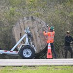 HP Communications contractors for Palm Coast government working this afternoon on U.S. 1 to repair the damage from another contractor's accidental cut of the city's high-speed internet lines. (© FlaglerLive)