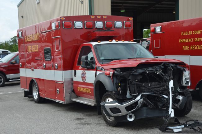 Rescue 22 after the crash. The driver of the $215,000 ambulance  had been making an illegal U-turn on Old Kings Road. (© FlaglerLive)