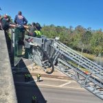 The rescue off the State Road 100 bridge as it was resolving the hour-long incident over I-95. (FCSO)