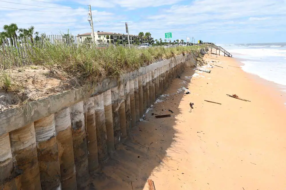 The ugliness of "resiliency" laid bare: the sea wall in Flagler Beach. The state is preparing to build many more, while doing nothing about the causes of sea rise. (© FlaglerLive)