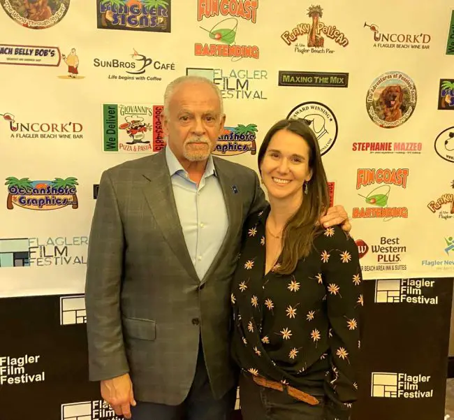 * Ric Prado, a Cuban-born, retired CIA officer and author of the book “Black Ops: The Life of a CIA Shadow Warrior,” was one of the “Pedro Paners” profiled in the documentary film “Good Things Will Come.” The film’s director, first-time filmmaker Janelle Bose, is pictured with Prado at the Flagler Film Festival. FlaglerLive photo