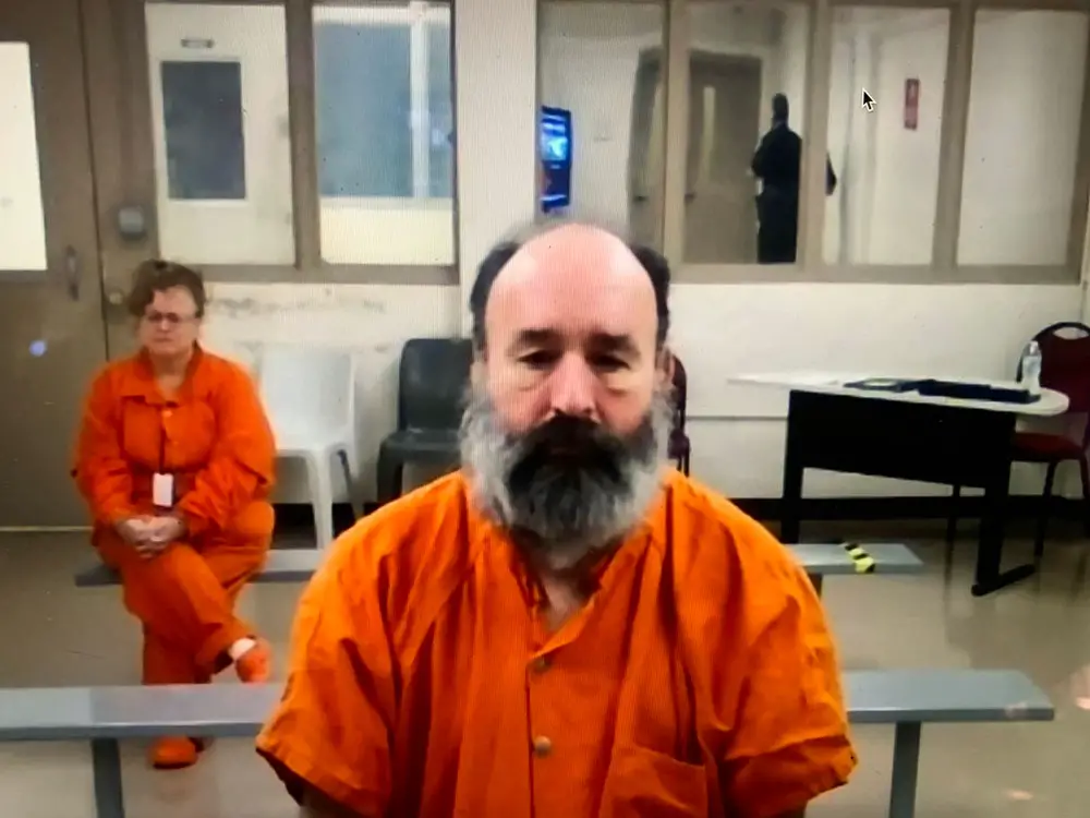 Richard Dunn today, attending the hearing from the Flagler County jail, his beard significantly thicker than when he was first incarcerated four months ago. (© FlaglerLive via zoom)