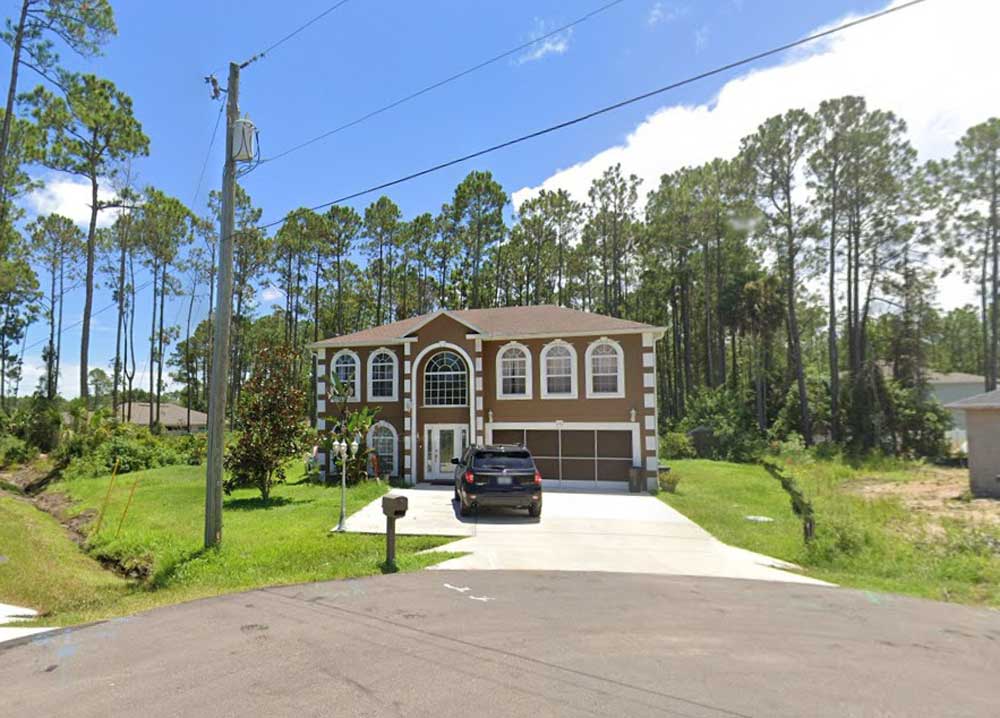 The two-level house at 14 Ricker Place, where the stand-off has unfolded. (Google)