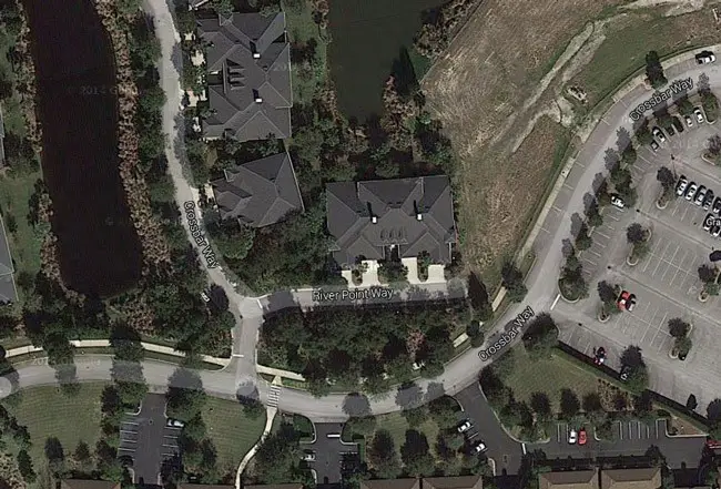 The house at 6 River Point Drive (identified as  Crossbar Way), toward the center of the image, is near the Grand Haven Golf Club. 