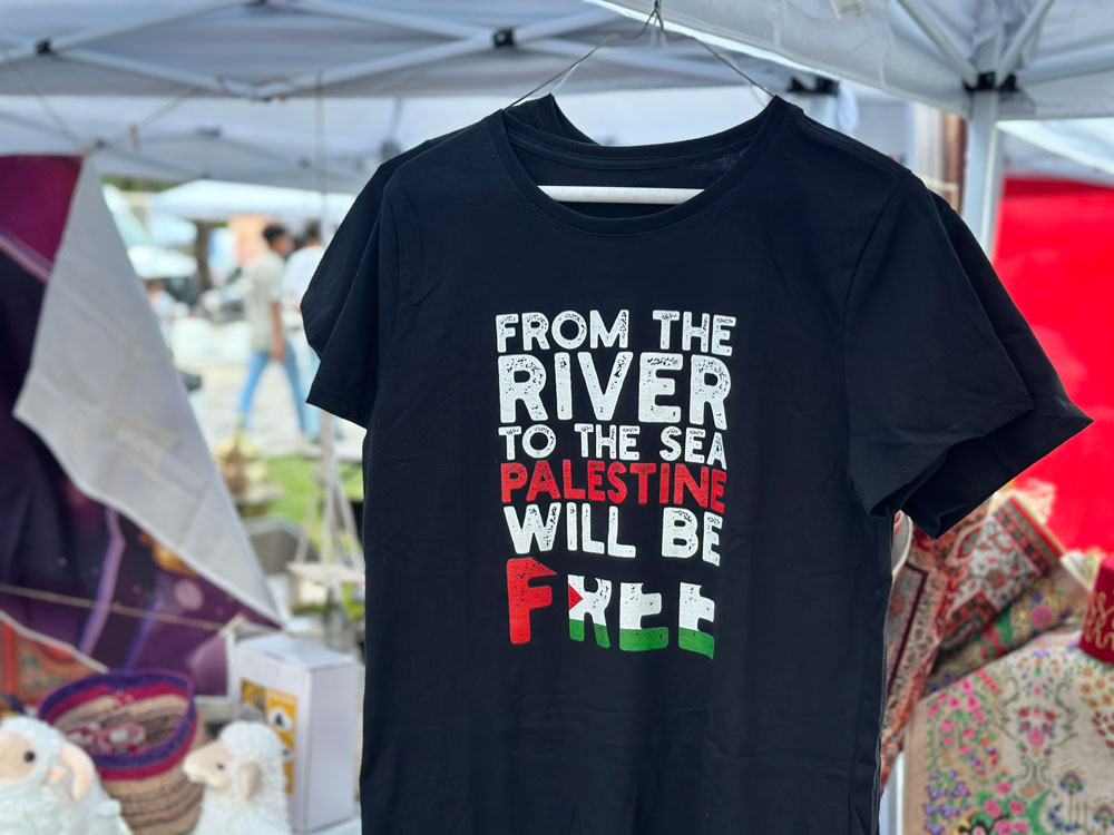 There is no question that "river-to-the-sea" emblems and rhetoric, like that t-shirt sold at an Arab fest in Orlando last May, is a genocidal, anti-Semitic call for the eradication of Israel. (© FlaglerLive)