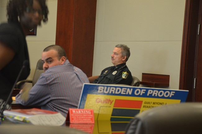 Waldemar Rivera, accused of raping his step-daughter, just before closing arguments this morning in Flagler County Circuit Court.  His lawyer, Regina Nunnally, is to the left. (c FlaglerLive)