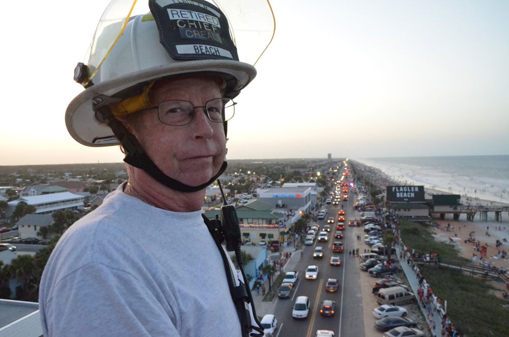 Robbie Creal above the city during a July 4 celebration. (© FlaglerLive)