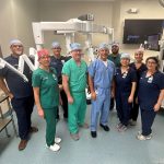 Dr. Gary Allen and the AdventHealth Waterman team members trained extensively to support state-of-the-art robotic-assisted cardiac surgery. Pictured left to right: David Morales, Barb Short, “Terry” Donald Caskey, David Ellingson, PA, Dr. Gary Allen, Eric Soto, Xiaoya Liu, Perla Ruiz, and Teresa Haire. (AdventHealth)