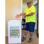 Sanitation Director, Rob Smith with a Trex receptacle. (Flagler Beach)