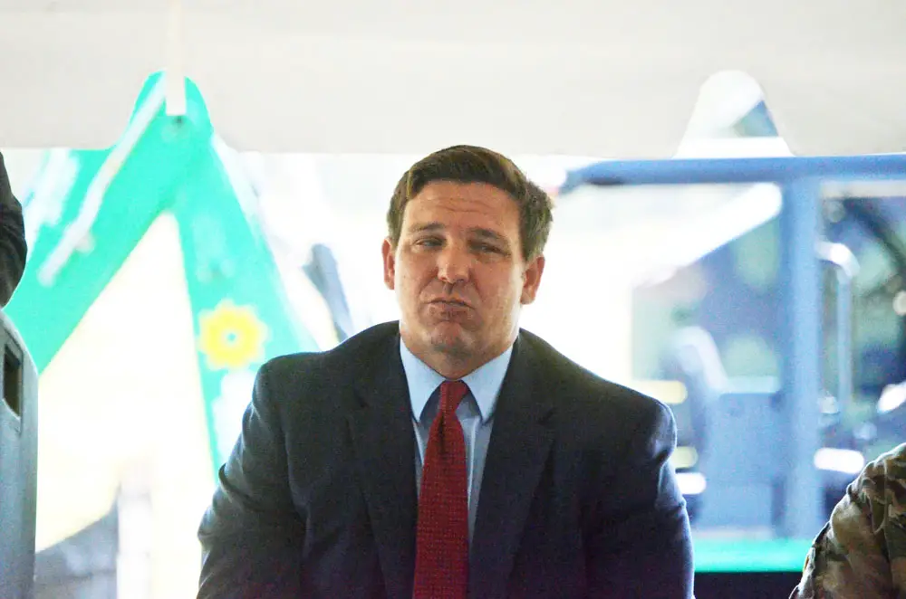 Gov. Ron DeSantis has tailored mannerisms, speech modes and tactics after Donald Trump, such as attacks on judges who disagree with his policies. (© FlaglerLive)