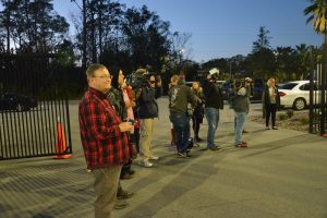 Ron with other media in January outside the Sheriff's Office's Operations Center, awaiting the exit of a murder suspect. (© FlaglerLive)