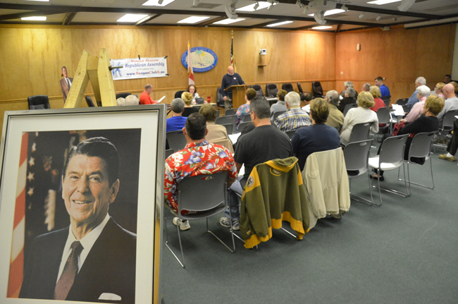 In the glow of Ronald Reagan: Monday's meeting of the Ronald Reagan Republican Assemblies at the Palm Coast City Council introduced six of seven candidates running against local incumbents. (© FlaglerLive)