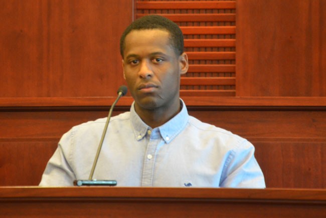 Roodlyn Mompremier on the stand in his own defense on Tuesday. (c FlaglerLive)