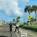 Police had roped off a section of the dunes on State Road A1A just north of State Road 100. (© FlaglerLive)