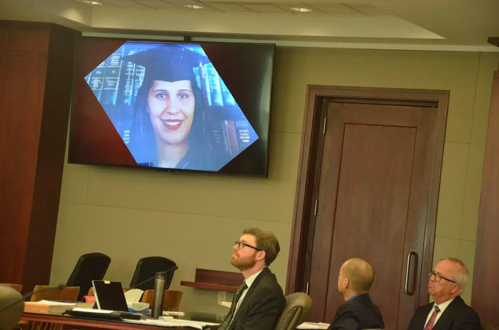 An image of Zuheily Roman Rosado the prosecution displayed during closing arguments in the case that ended with a guilty verdict for Joseph Bova, who sat between his two attorneys, Josh Mosley, left, and Matt Phillips, Monday in circuit court. (© FlaglerLive)