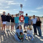 Some Rotary Club of Flagler Beach club members and their family at the Drown Zero station at 8th Street South. Pictured from left to right standing: Debby Meyer, Bob Snyder, Sandra McDerrmott, Tom Gillan, Art MacQueen, Gingie MacQueen, Keith Kessler, Dina Kessler. Sitting: Savannah and Kai Prince and Cindy Dalecki.