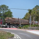The crash took place well north of the roundabout at State Road 11 and County Road 304, as a tractor trailer was making a turn onto a logging road. (© FlaglerLive)