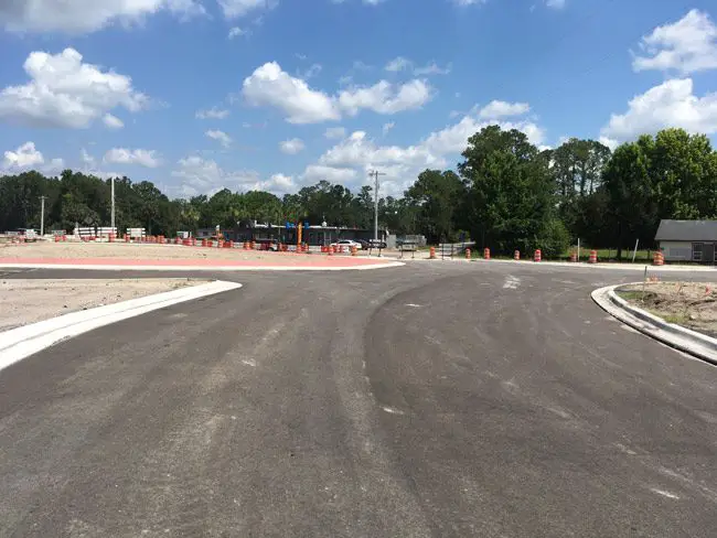 The roundabout at U.S. 1 and Old Dixie Highway today, deserted of workers, as it has been for nine weeks. Work is supposed to resume on July 8. (© FlaglerLive)