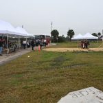 The five county commisisoners to the right marking the groundbreaking of Flagler County Fire Station 51 at County Road 305 and State Road 100 this morning. (© FlaglerLive)
