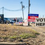 Voting signs are seen in Jackson, Miss., during the 2023 governor’s race.