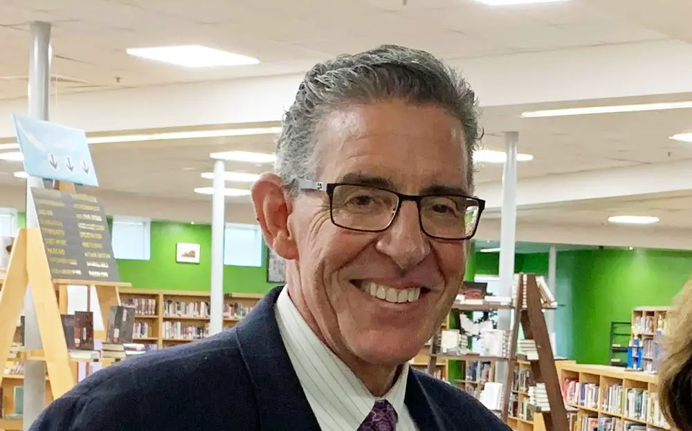 Tom Russell last summer at the FPC library, when he hosted a meet-and-greet ahead of his tenure as principal. (© FlaglerLive)