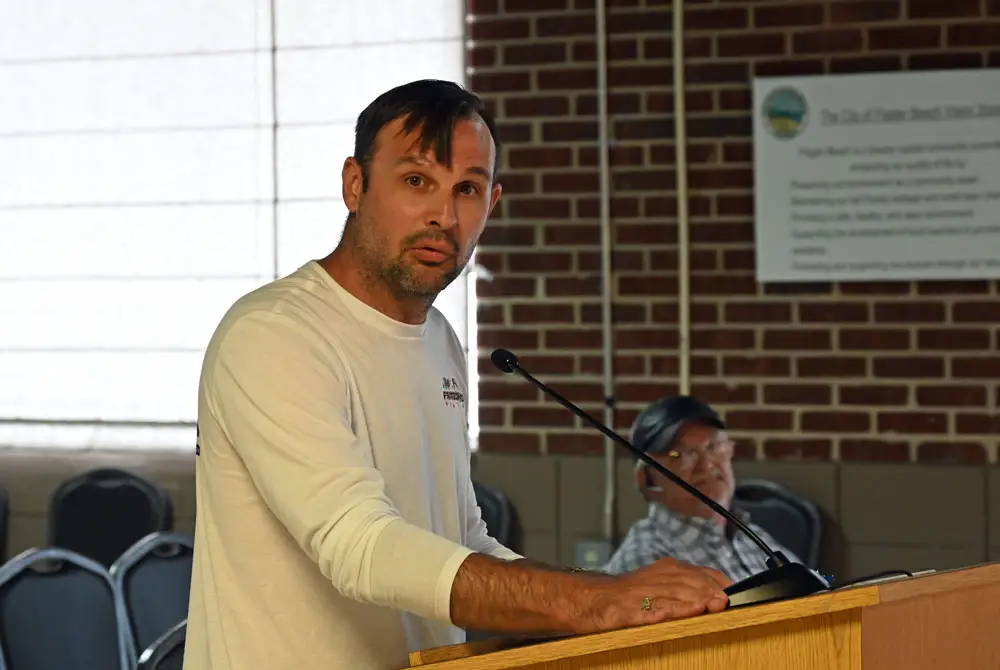 Ryan Allen, whose company would be producing the July 4 fireworks in Flagler Beach, addressing the city commission this afternoon. (© FlaglerLive)