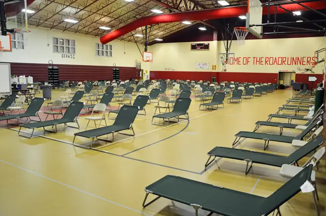 The cots lined up and ready at Rymfire Elementary, the special needs shelter. It is one of four shelters prepared for Hurricane Irma in Palm Coast. (© FlaglerLive)