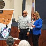 Jorge Salinas with Heidi Petito at a July send-off for Al Hadeed, the retiring county attorney. (© FlaglerLive)