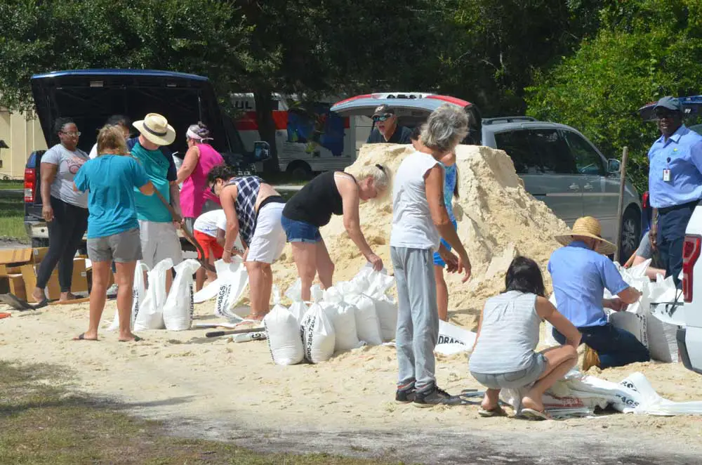 Sand-bagging ahead of Dorian in Flagler County three years ago. (© FlaglerLive)
