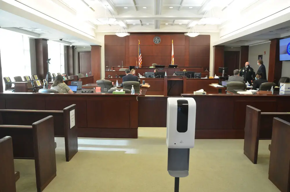 A hand sanitizer was front and center at the entrance to Courtroom 401 at the Flagler County Courthouse, site of Florida's first criminal trial this week since the covid-induced closure of courthouses across the state in spring. (© FlaglerLive)