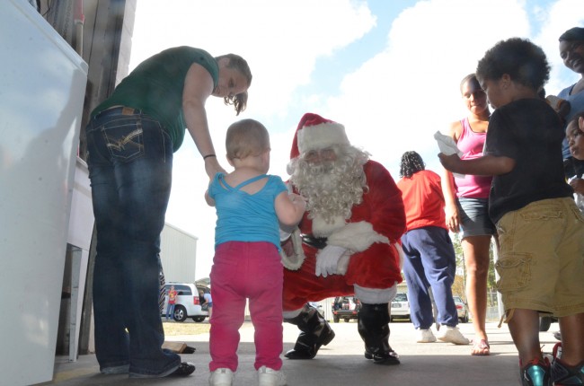 Santa arrives. Click on the image for larger view. (© FlaglerLive)