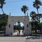 Students converse near an entrance to New College of Florida in Sarasota.