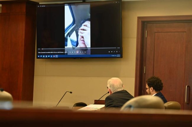 The jury for the first time today saw savannah Gonzalez, the 22-year-old victim of the shooting, in brief video clips she had taken of Brenan Hill's anger shortly before the shooting. Hill did not look up. (© FlaglerLive)