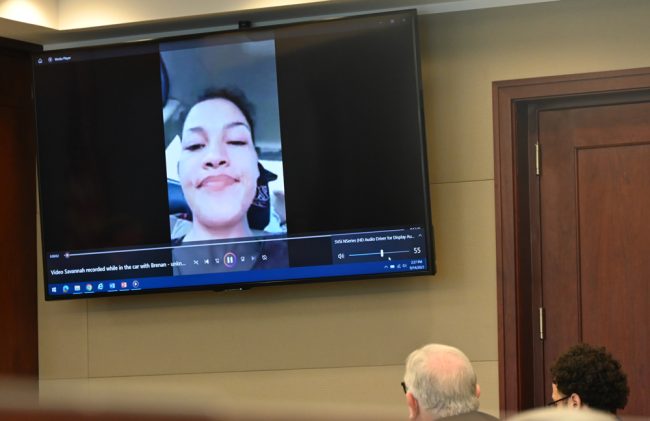 There were only a few glimpses of Savannah Gonzalez during the trial, in brief moments from video she took on her cell phone, and only one with the semblance of a smile. Hill and his attorney, Gerald Bettman, are at the bottom right. (© FlaglerLive)