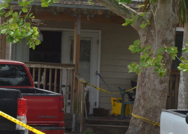 Scene of the crime: Lucas Gore was shot and killed by his father on the back porch, at a glass table. Click on the image for larger view. (© FlaglerLive)